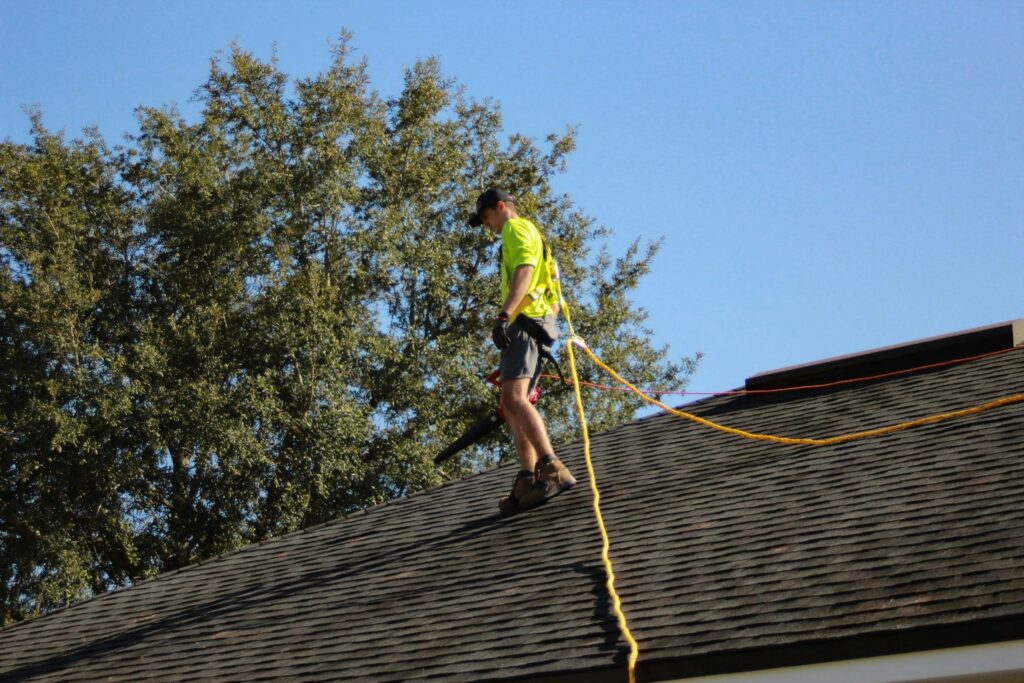 a man standing on a roof