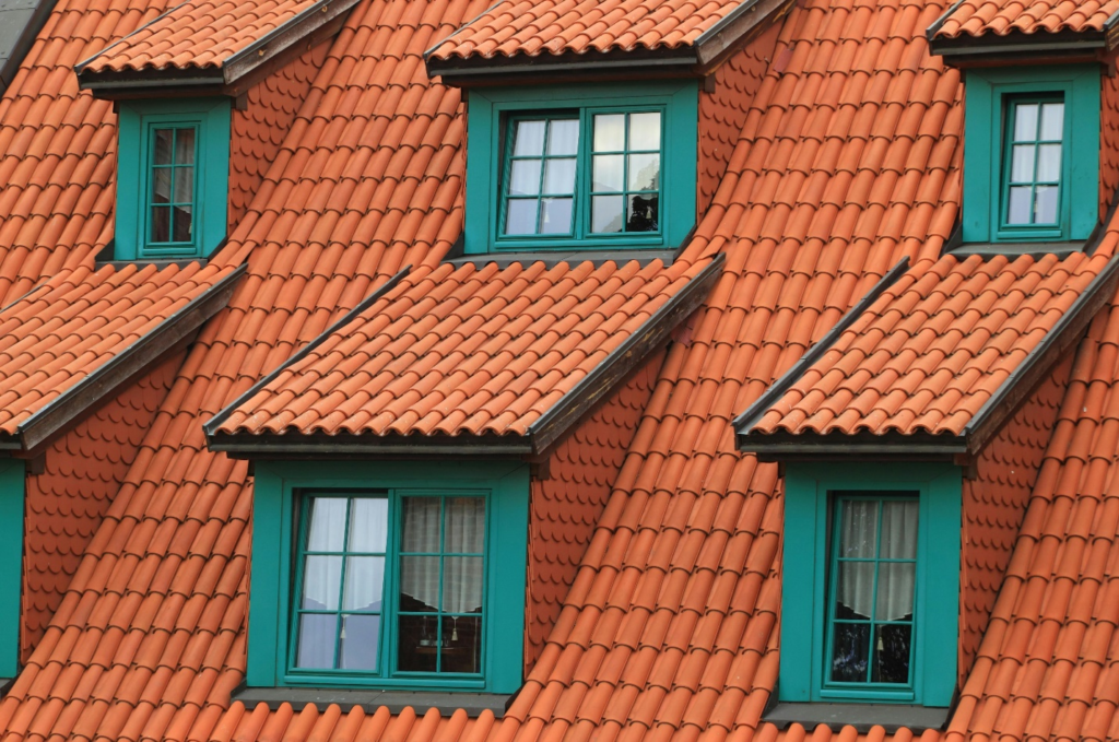 orange shingles on green windows