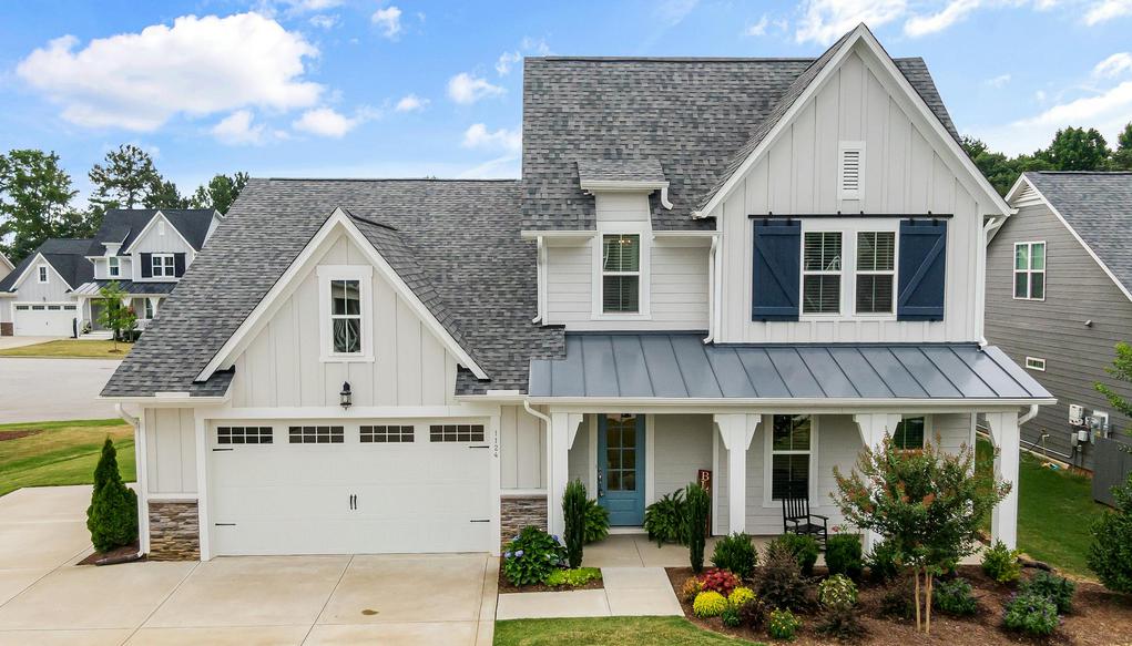 A house with a shingle roofing