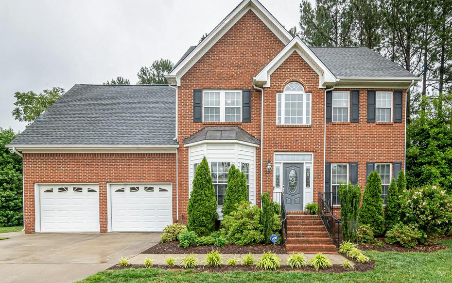 A house with shingle roofing