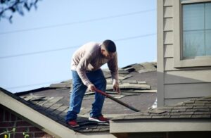 Shingle repairs underway.