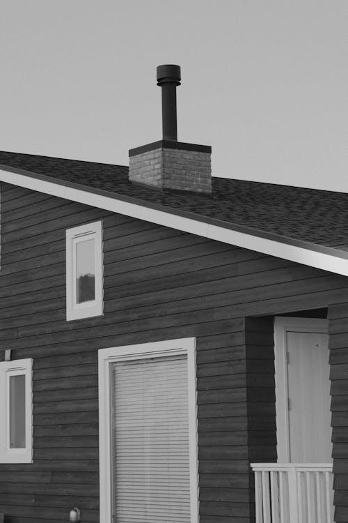 An image of a home with a chimney