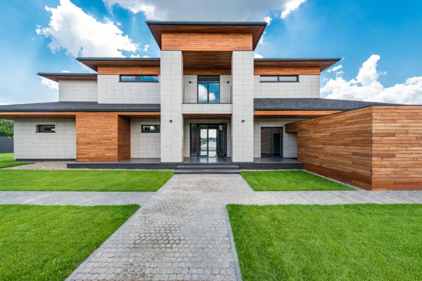 An image of a house against the blue sky