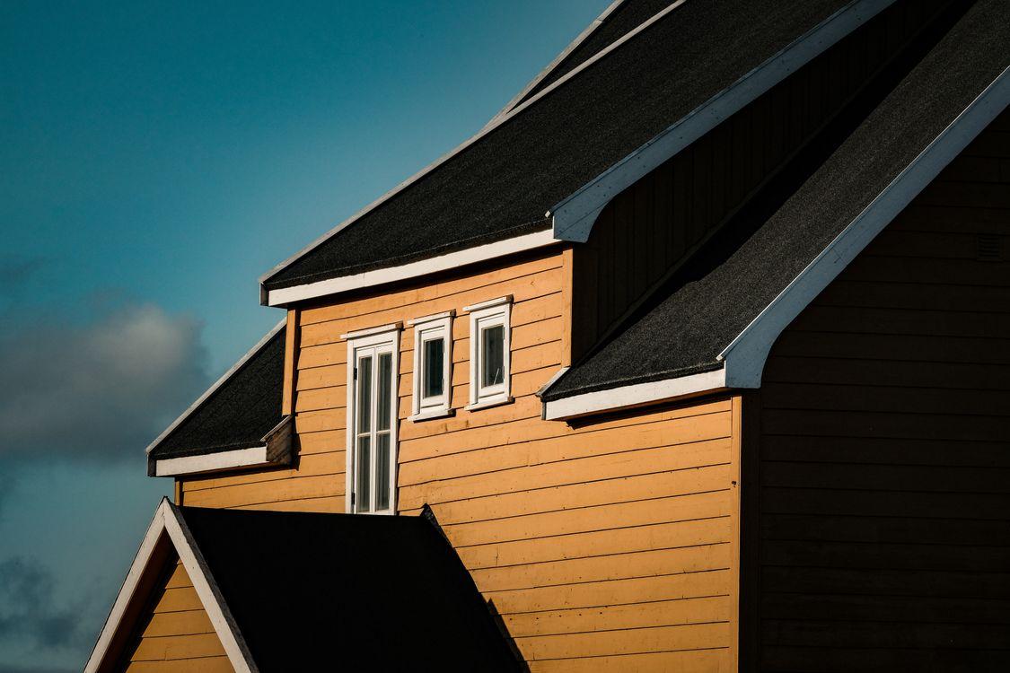 An image of a house under the sky