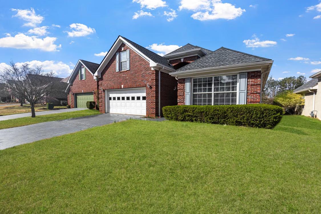 An image of a red suburban house