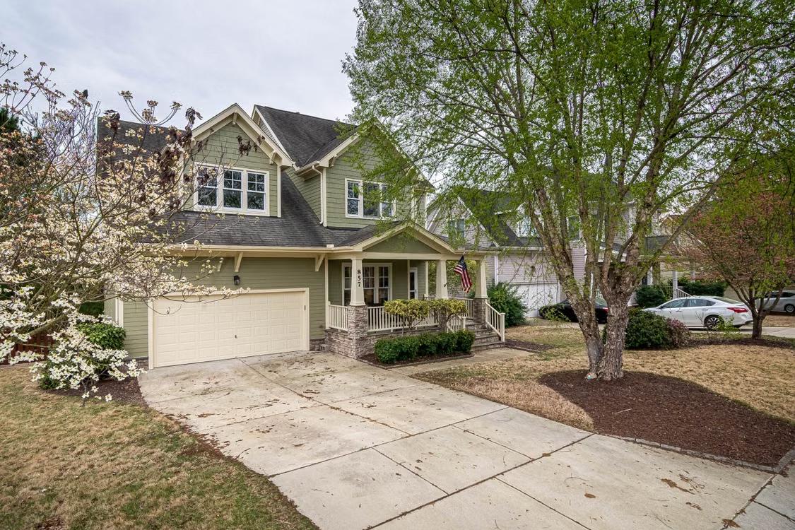 An image of a house with a driveway